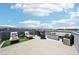Spacious rooftop patio with plush lounge seating and a dining area, perfect for outdoor entertaining at 8042 Misty Canyon Ave, Las Vegas, NV 89113