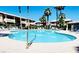 Resort-style pool with plenty of seating for residents to enjoy in the warm weather at 8410 Eldora Ave # 2046, Las Vegas, NV 89117