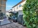 Cozy outdoor patio area featuring a swing and covered grill, perfect for enjoying the backyard ambiance at 8754 Brindisi Park Ave, Las Vegas, NV 89148