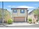 Charming two-story home showcasing a neutral color scheme, complemented by a well-maintained front yard and a two car garage at 8755 Spanish Ridge Ave, Las Vegas, NV 89148