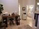 Open-concept living space flows into a bathroom and a bedroom at 9705 Templemore Ave # 102, Las Vegas, NV 89129