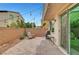 Backyard area featuring a brick patio, desert landscaping, barbecue, and string lights at , Las Vegas, NV 89139