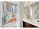 Bathroom featuring single sink vanity with bath/shower combo with decorative curtain at , Las Vegas, NV 89139