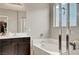 Bathroom featuring separate tub and shower, single sink vanity, and neutral paint at , Las Vegas, NV 89139