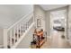 Inviting entry hallway leading to the staircase and living area, with stylish console table and decor at , Las Vegas, NV 89139