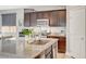 Close up of kitchen island with granite countertops, stainless steel appliances and dark cabinets at , Las Vegas, NV 89139