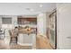 Beautiful kitchen features granite countertops, stainless steel appliances, island with seating, and dark cabinets at , Las Vegas, NV 89139