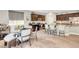 Open kitchen with stainless steel appliances, a granite countertop island, and a dining area at , Las Vegas, NV 89139