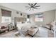 Spacious main bedroom features stylish decor, ceiling fan, plush carpet, and bright windows at , Las Vegas, NV 89139