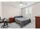 Cozy bedroom with a comfortable bed, side tables, and ample natural light at 10101 Heron Lake Ave, Las Vegas, NV 89178