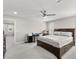 Bright bedroom featuring a ceiling fan, carpet flooring, and ample space at 10101 Heron Lake Ave, Las Vegas, NV 89178