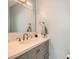 Stylish half-bathroom features new vanity with white countertop, and blue painted walls at 104 Glendive St, Henderson, NV 89012