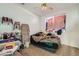 Bedroom with a cozy bed, natural light, and a personal touch at 104 Glendive St, Henderson, NV 89012