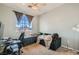 Cozy bedroom with neutral walls, a ceiling fan, and a comfortable atmosphere at 104 Glendive St, Henderson, NV 89012