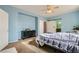 Bedroom featuring a large window, ceiling fan, and plenty of space at 104 Glendive St, Henderson, NV 89012