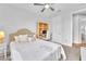 Comfortable bedroom with a soft queen bed and a study desk, ideal for relaxation at 10601 Skye Arroyo Ave, Las Vegas, NV 89166