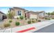 Well-maintained single-story home with a tile roof, desert landscaping, and ample curb appeal at 10601 Skye Arroyo Ave, Las Vegas, NV 89166