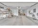 Spacious three car garage featuring ample storage and a clean finish at 10601 Skye Arroyo Ave, Las Vegas, NV 89166