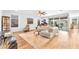 Bright living area with hardwood floors, sliding doors to backyard, and comfortable seating at 10601 Skye Arroyo Ave, Las Vegas, NV 89166