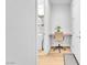 Office nook featuring a wooden desk, rolling chair, and natural light at 10601 Skye Arroyo Ave, Las Vegas, NV 89166