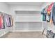Spacious walk-in closet with built-in shelving and ample room for organization at 10601 Skye Arroyo Ave, Las Vegas, NV 89166