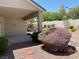 Beautiful backyard with covered patio, desert landscaping, and rock pathway at 10816 Elm Ridge Ave, Las Vegas, NV 89144