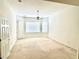 Bright bedroom features a large window for natural light, and a ceiling fan at 10816 Elm Ridge Ave, Las Vegas, NV 89144