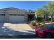 Charming single story home featuring a stone accented facade, manicured landscaping and a spacious driveway at 10816 Elm Ridge Ave, Las Vegas, NV 89144