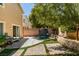 The backyard features a trampoline, a built-in brick garden bed, a paved patio and a BBQ grill at 11004 Napa Ridge Dr, Las Vegas, NV 89144