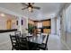 Dining area view showcases the kitchen and living room, enhancing the open-concept design at 11004 Napa Ridge Dr, Las Vegas, NV 89144