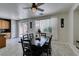 The dining room showcases natural light and a view of the backyard through a sliding glass door at 11004 Napa Ridge Dr, Las Vegas, NV 89144