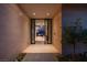 Elegant entryway featuring a modern glass door and stylish decor at 11707 Discovery Canyon Dr, Las Vegas, NV 89135