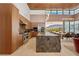 Modern kitchen featuring a large island, stainless steel appliances, and open access to the dining area at 11707 Discovery Canyon Dr, Las Vegas, NV 89135