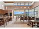 Open layout of the kitchen and dining area with mountain views and modern design at 11707 Discovery Canyon Dr, Las Vegas, NV 89135