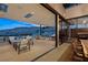 Spacious covered patio with comfortable seating, ideal for entertaining and enjoying scenic views at 11707 Discovery Canyon Dr, Las Vegas, NV 89135