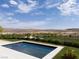 Beautiful pool and serene desert views create a relaxing outdoor oasis at 11707 Discovery Canyon Dr, Las Vegas, NV 89135