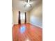 Well-lit bedroom featuring neutral paint, laminate flooring and ample natural light at 1201 Dusty Creek St, Las Vegas, NV 89128