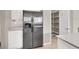 A stainless steel refrigerator is located next to the pantry at 176 Jay Porter Ave, Henderson, NV 89002