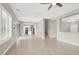 Spacious living area with tile flooring, open access to the kitchen, and large windows at 176 Jay Porter Ave, Henderson, NV 89002