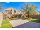 Backyard with manicured faux lawn, paver patio, and minimalist landscaping at 1794 Morro Vista Dr, Las Vegas, NV 89135