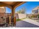 Private backyard featuring hardscaped patio, artificial grass, and exterior landscape at 1794 Morro Vista Dr, Las Vegas, NV 89135