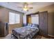 Bedroom with murphy bed, ceiling fan, and modern finishes offers a cozy retreat at 1794 Morro Vista Dr, Las Vegas, NV 89135
