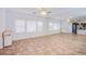 Bright bonus room with large mirror, tile floor, ceiling fan and multiple windows at 1794 Morro Vista Dr, Las Vegas, NV 89135
