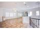 Spacious bonus room featuring tile floors, large mirrors, fan, and ample natural light at 1794 Morro Vista Dr, Las Vegas, NV 89135