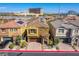 Charming two-story home with tile roof, solar panels, paver driveway, and manicured landscaping at 1794 Morro Vista Dr, Las Vegas, NV 89135