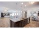 Spacious, open kitchen with stainless steel appliances and granite island at 1794 Morro Vista Dr, Las Vegas, NV 89135