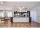 The kitchen features an island and stainless steel appliances at 1794 Morro Vista Dr, Las Vegas, NV 89135
