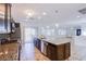The kitchen features a center island and granite countertops at 1794 Morro Vista Dr, Las Vegas, NV 89135