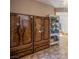 Close up of living room cabinets with decorative light fixture and accent molding at 1794 Morro Vista Dr, Las Vegas, NV 89135
