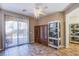 Cozy living room with sliding glass door, decorative lighting and designer cabinets at 1794 Morro Vista Dr, Las Vegas, NV 89135